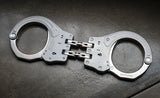 ASP - Handschelle Sentry mit Gelenk aus Stahl