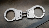 ASP - Handschelle Sentry mit Gelenk aus Stahl