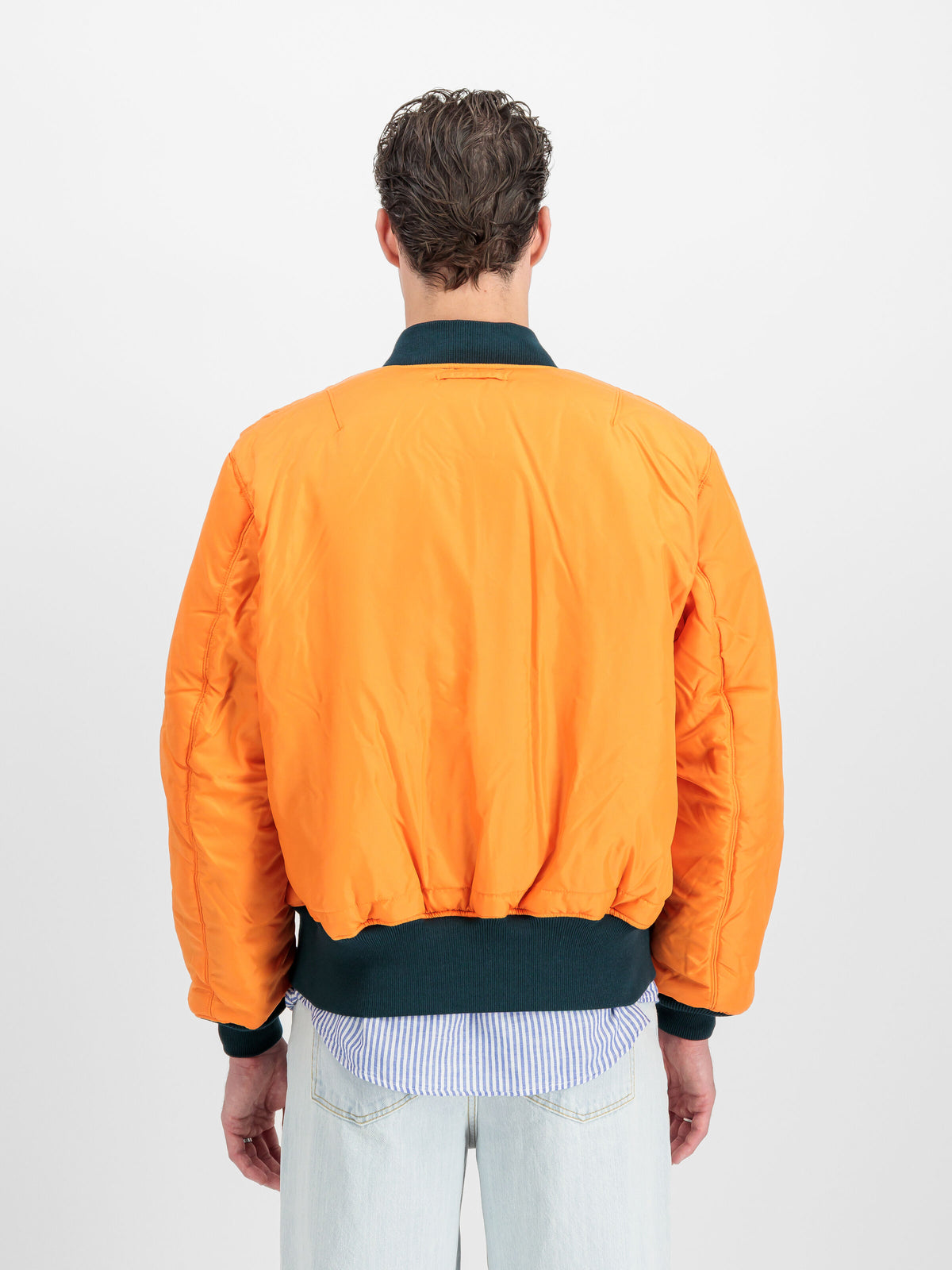 orange jacket, bomber jacket, quilted jacket, ribbed hem, back view