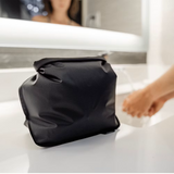 cosmetic bag, black pouch, zippered bag, travel case, small bag